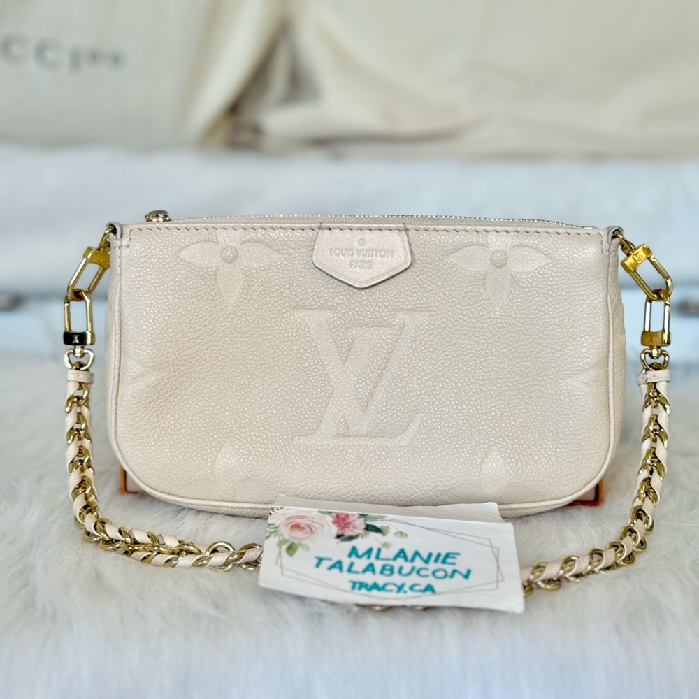 Louis Vuitton Small Pochette from Multi Pochette Cream Empreinte